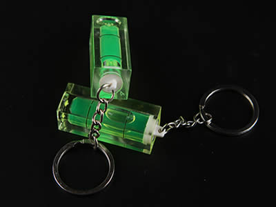 There is a plastic tubular bubble level vial in the key chain.